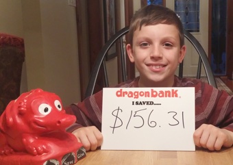 Child holding a sign that says how much they saved with DragonBank